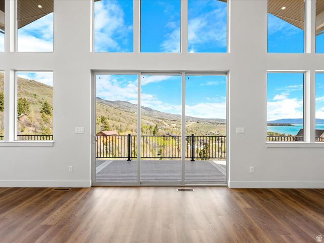 1159 North Broad Hollow Road Garden City, UT 84028 - Photo 1 of 55 Vaulted ceilings and wood-finish flooring complement the expansive sliding glass doors and multiple windows