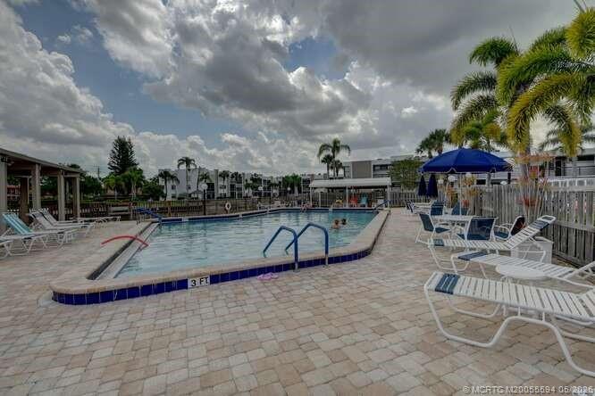 1950 Southwest Palm City Road, Unit 3209 Stuart, FL 34994 - Photo 44 of 64 Pool and sauna.