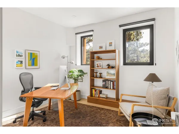 a view of swimming pool from a balcony
