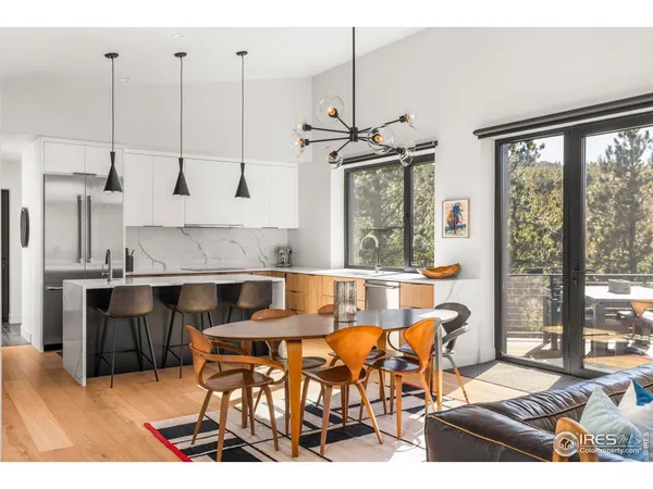 a view of kitchen with furniture and window
