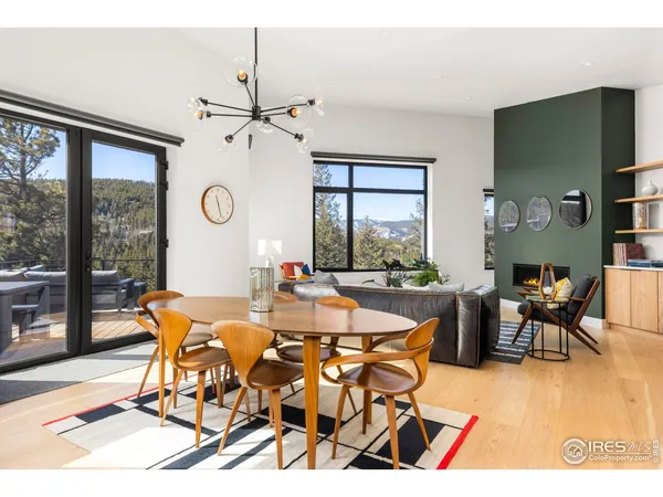 a view of a tables and chairs in patio