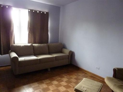 607 Surryse Road Lake Zurich, IL 60047 - Photo 12 of 15 a living room with furniture and a window