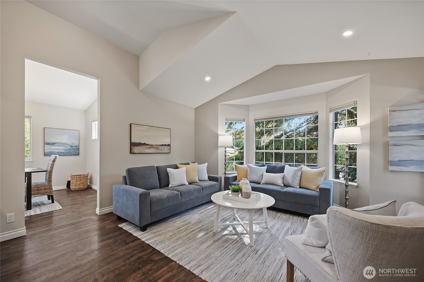 23707 Meridian Place West Bothell, WA 98021 - Photo 4 of 40 a living room with furniture and a large window