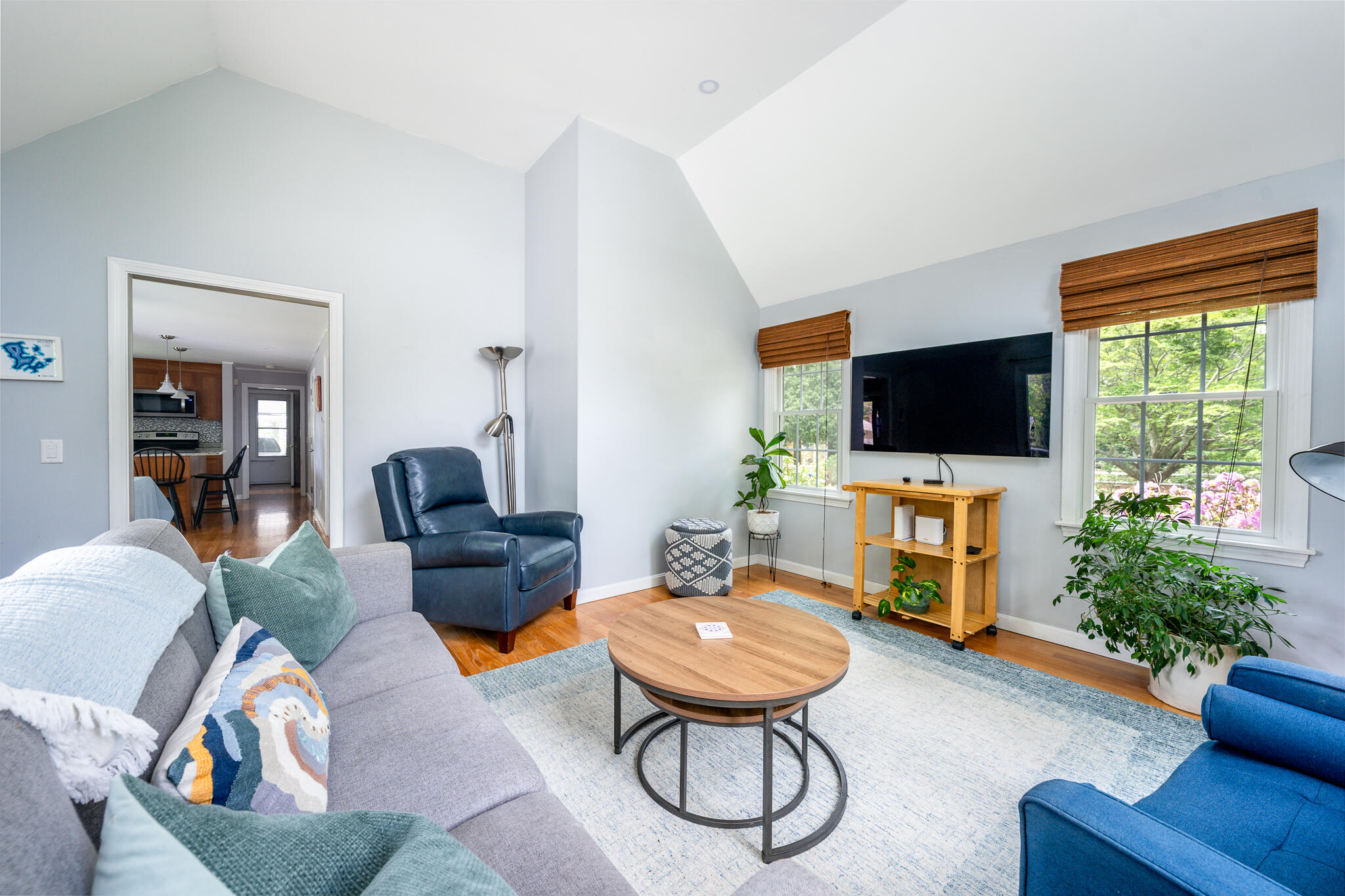 61 Angus Way Centerville, MA 02632 - Photo 25 of 59 a living room with furniture a flat screen tv and a window