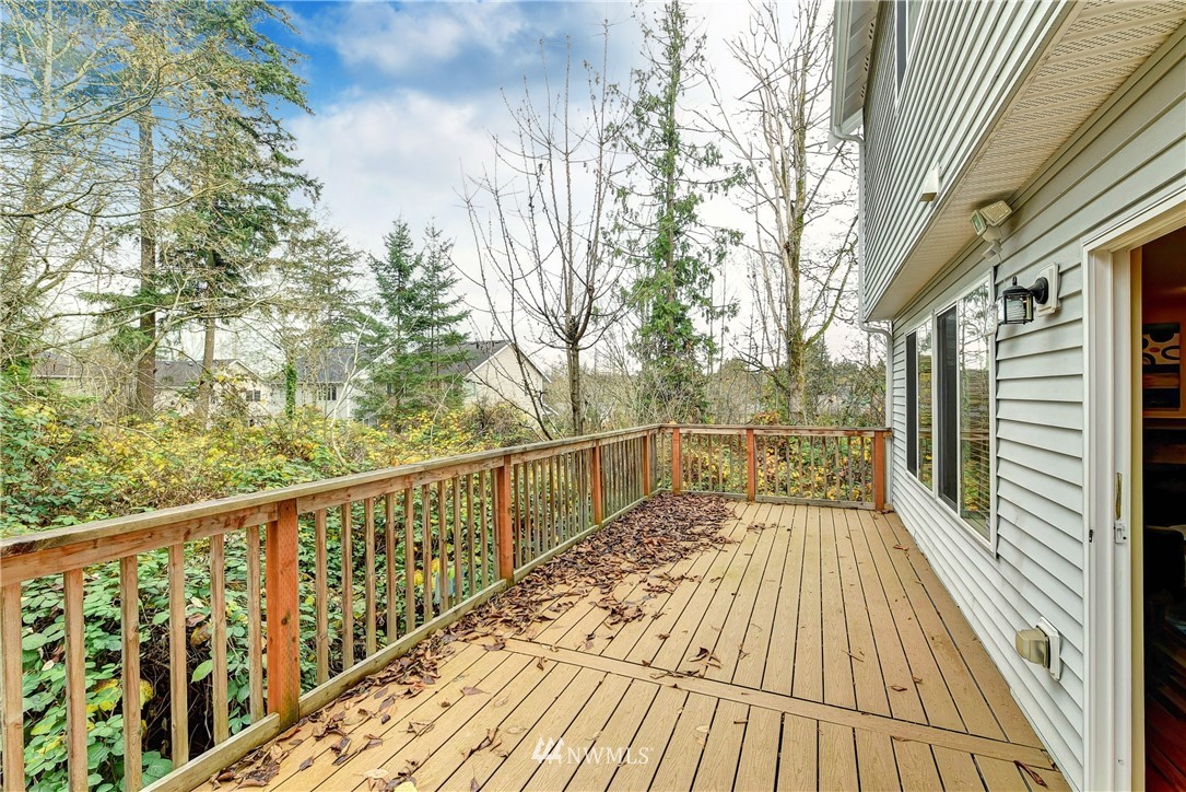 2324 194th Street Southeast Bothell, WA 98012 - Photo 21 of 22 a view of balcony with wooden floor and bench