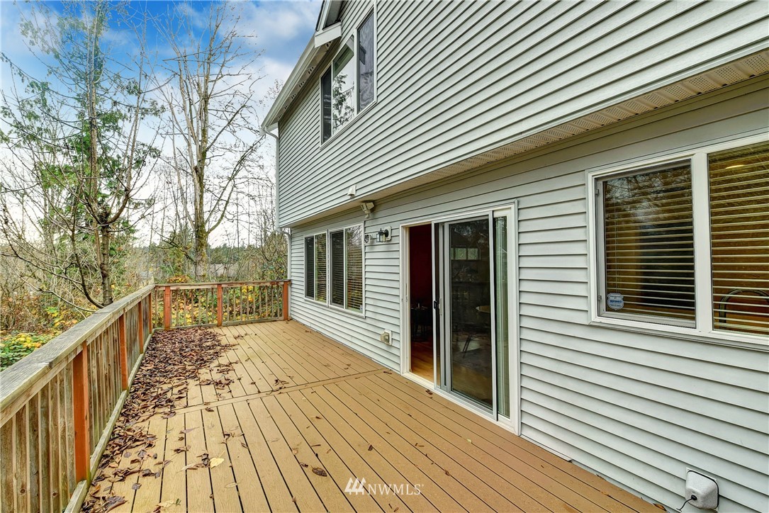 2324 194th Street Southeast Bothell, WA 98012 - Photo 22 of 22 a view of a house with backyard and wooden deck