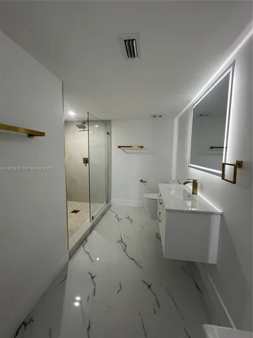 a view of a yard with a palm tree