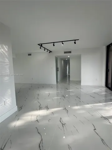 a bathroom with a sink toilet and mirror
