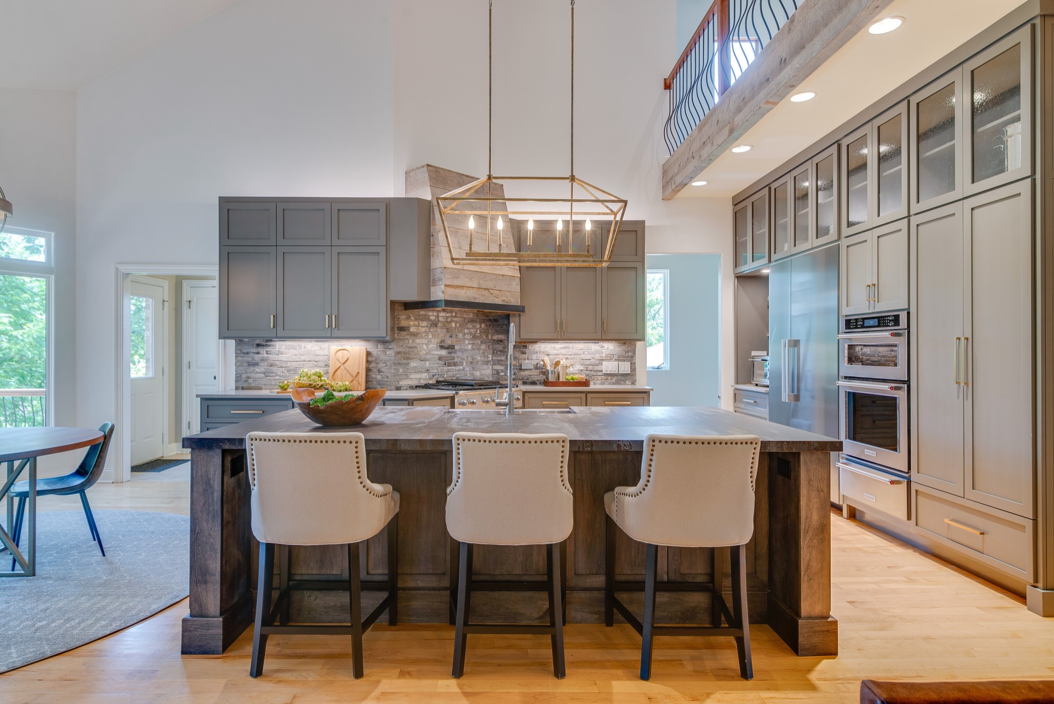 809 Aldwych Circle Franklin, TN 37069 - Photo 12 of 44 a dining area with furniture and chandelier