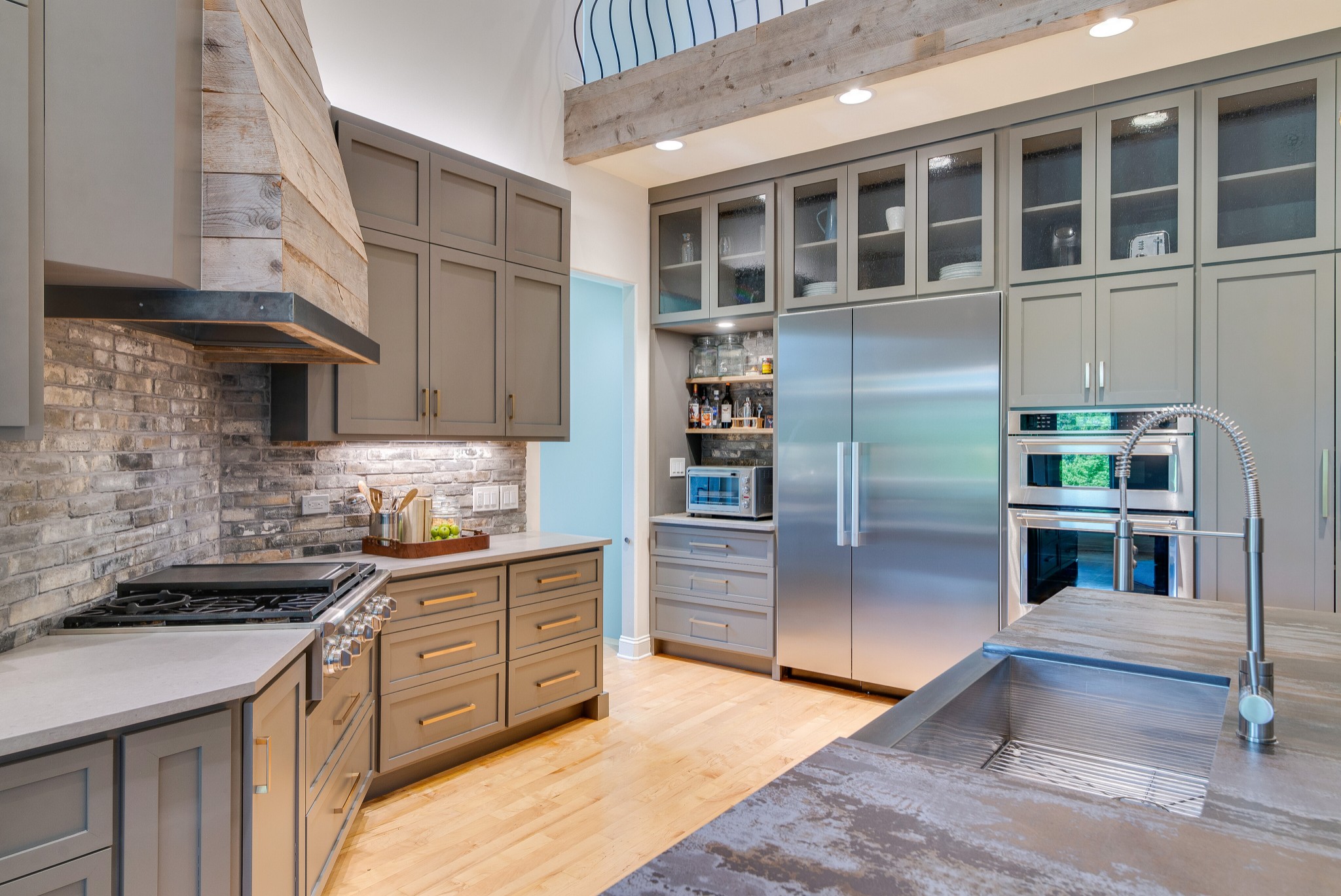 809 Aldwych Circle Franklin, TN 37069 - Photo 16 of 44 a kitchen with stainless steel appliances granite countertop a refrigerator and a sink