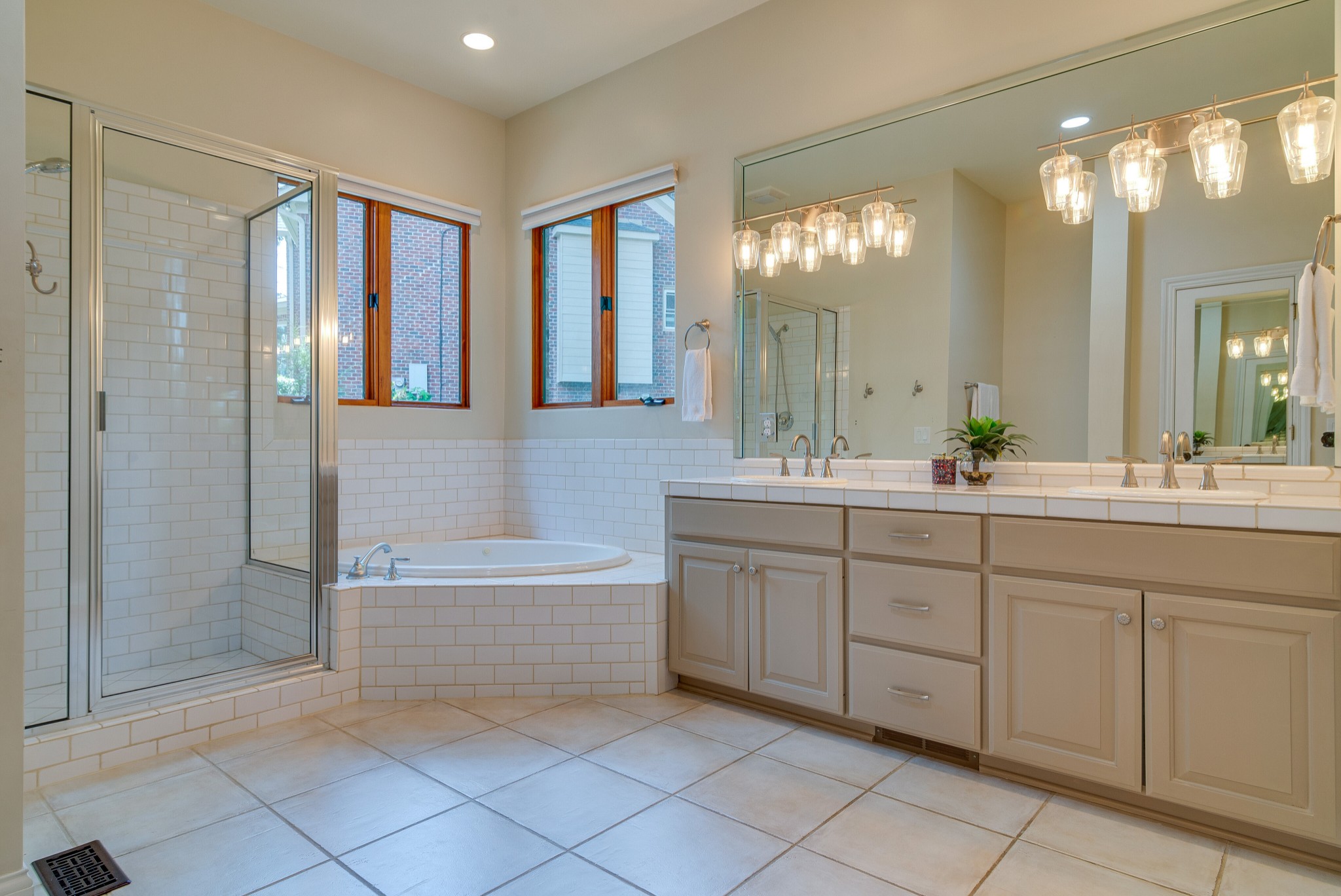 809 Aldwych Circle Franklin, TN 37069 - Photo 25 of 44 a bathroom with a double vanity sink mirror and bathtub