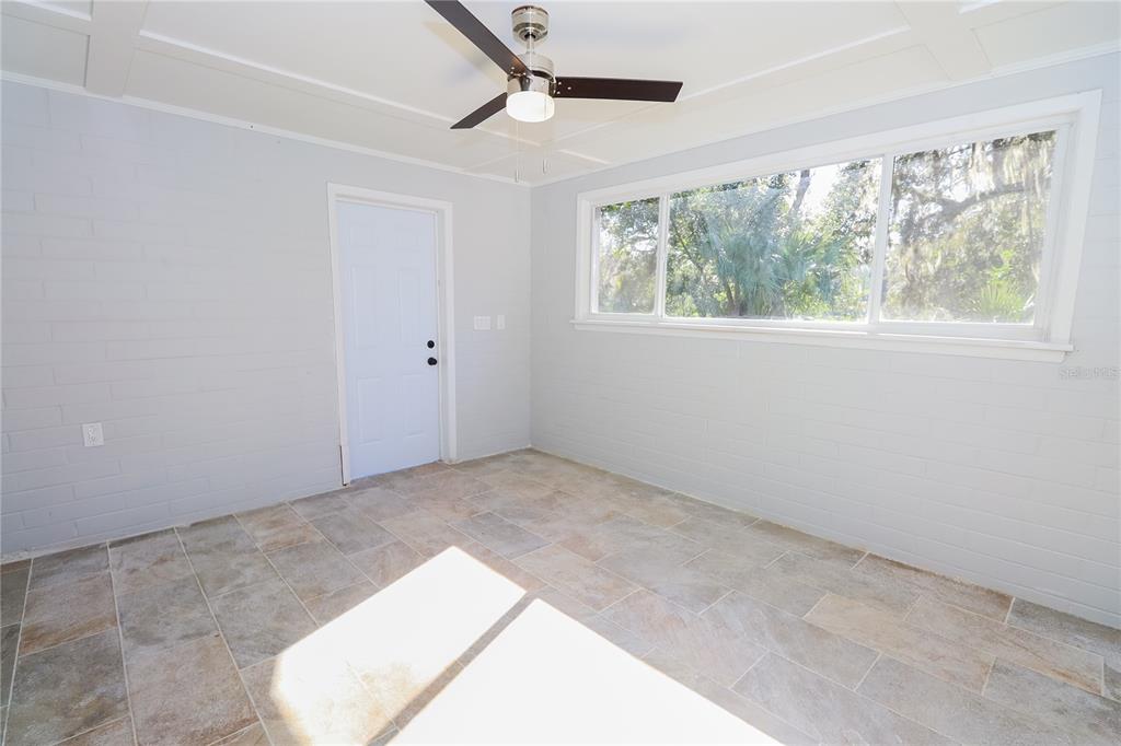 1850 Northwest 35th Street Ocala, FL 34475 - Photo 7 of 24 an empty room with a window