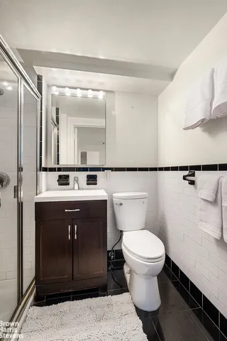 a bedroom with a large bed and a view of bedroom