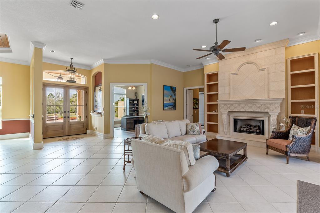 3700 Como Street Port Charlotte, FL 33948 - Photo 11 of 88 a living room with furniture and a fireplace