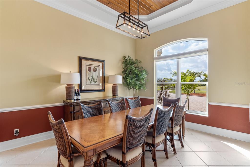 3700 Como Street Port Charlotte, FL 33948 - Photo 17 of 88 a view of a dining room with furniture window and outside view