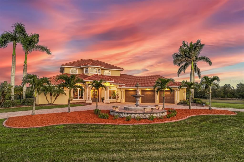 3700 Como Street Port Charlotte, FL 33948 - Photo 2 of 88 a view of a swimming pool with a garden and plants