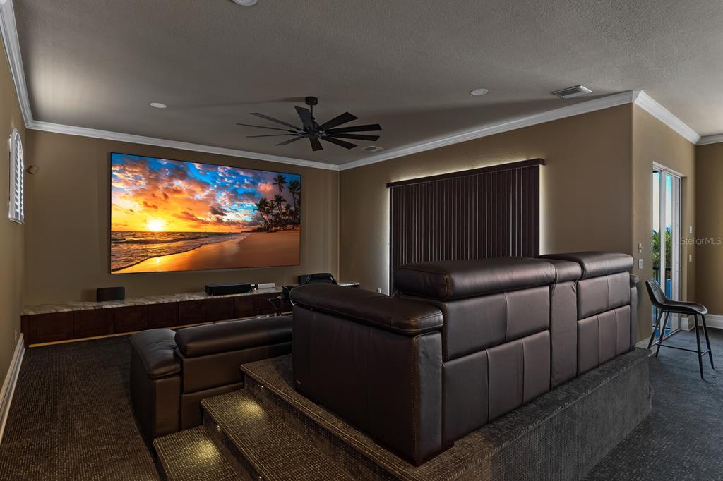 3700 Como Street Port Charlotte, FL 33948 - Photo 57 of 88 a room with furniture projector and screen