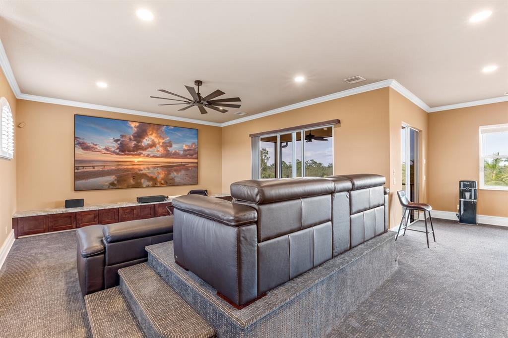 3700 Como Street Port Charlotte, FL 33948 - Photo 62 of 88 a living room with furniture and a large window