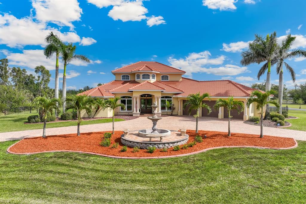 3700 Como Street Port Charlotte, FL 33948 - Photo 72 of 88 a view of a swimming pool with a table and chairs