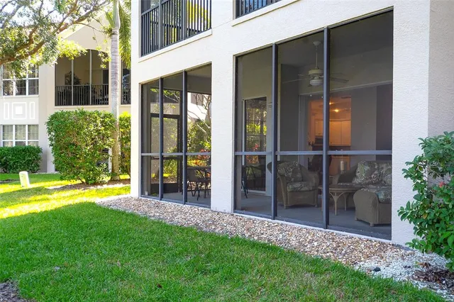 a view of an house with backyard space and garden