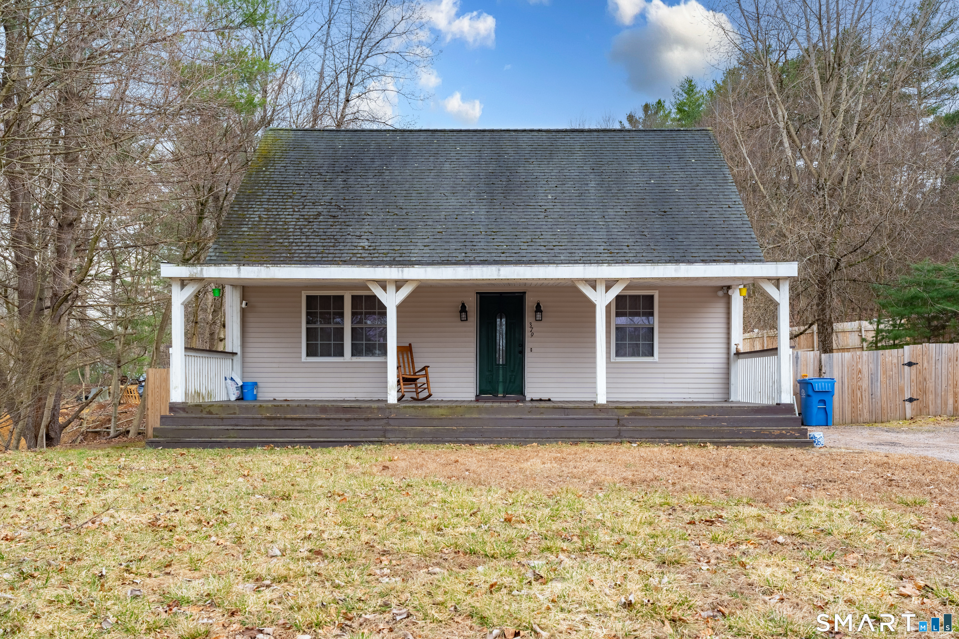 379 Christian Hill Road Brooklyn, CT 06234 - Photo 7 of 40 a front view of a house with a yard