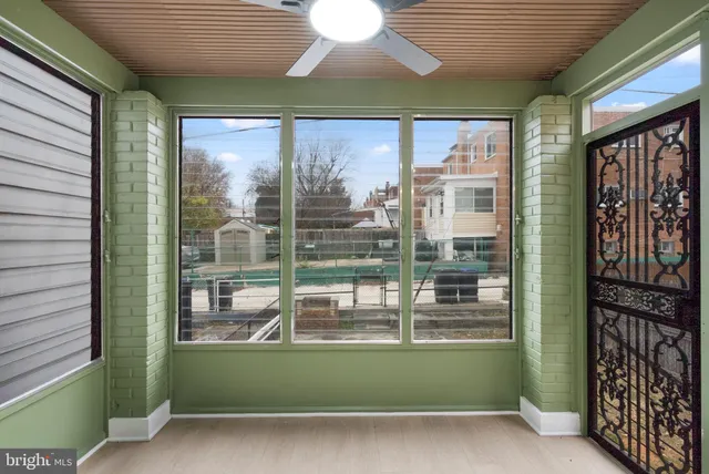 a view of a glass door with a balcony