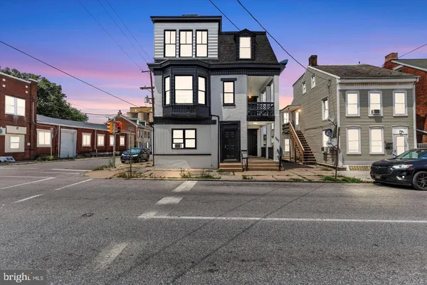 a view of a building with a street