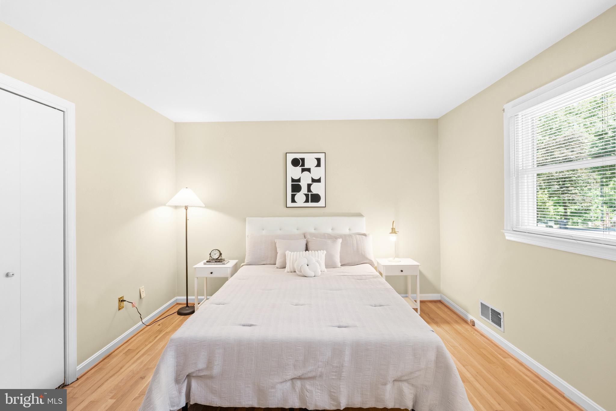 6604 Grey Fox Drive Springfield, VA 22152 - Photo 19 of 46 a bedroom with a bed and a window