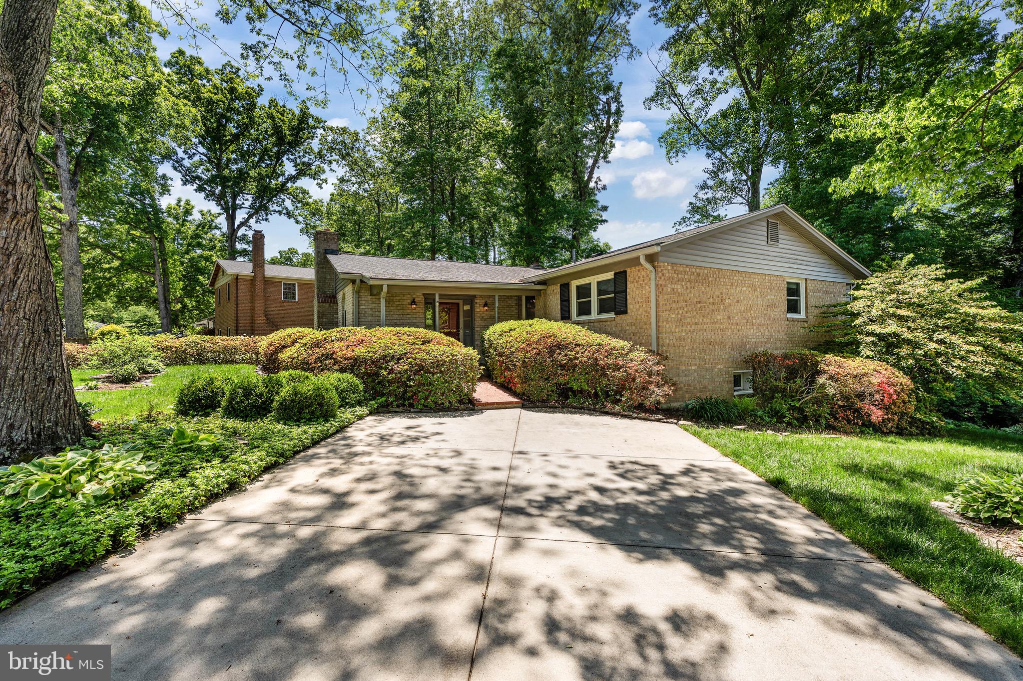 6604 Grey Fox Drive Springfield, VA 22152 - Photo 2 of 46 a house with a yard