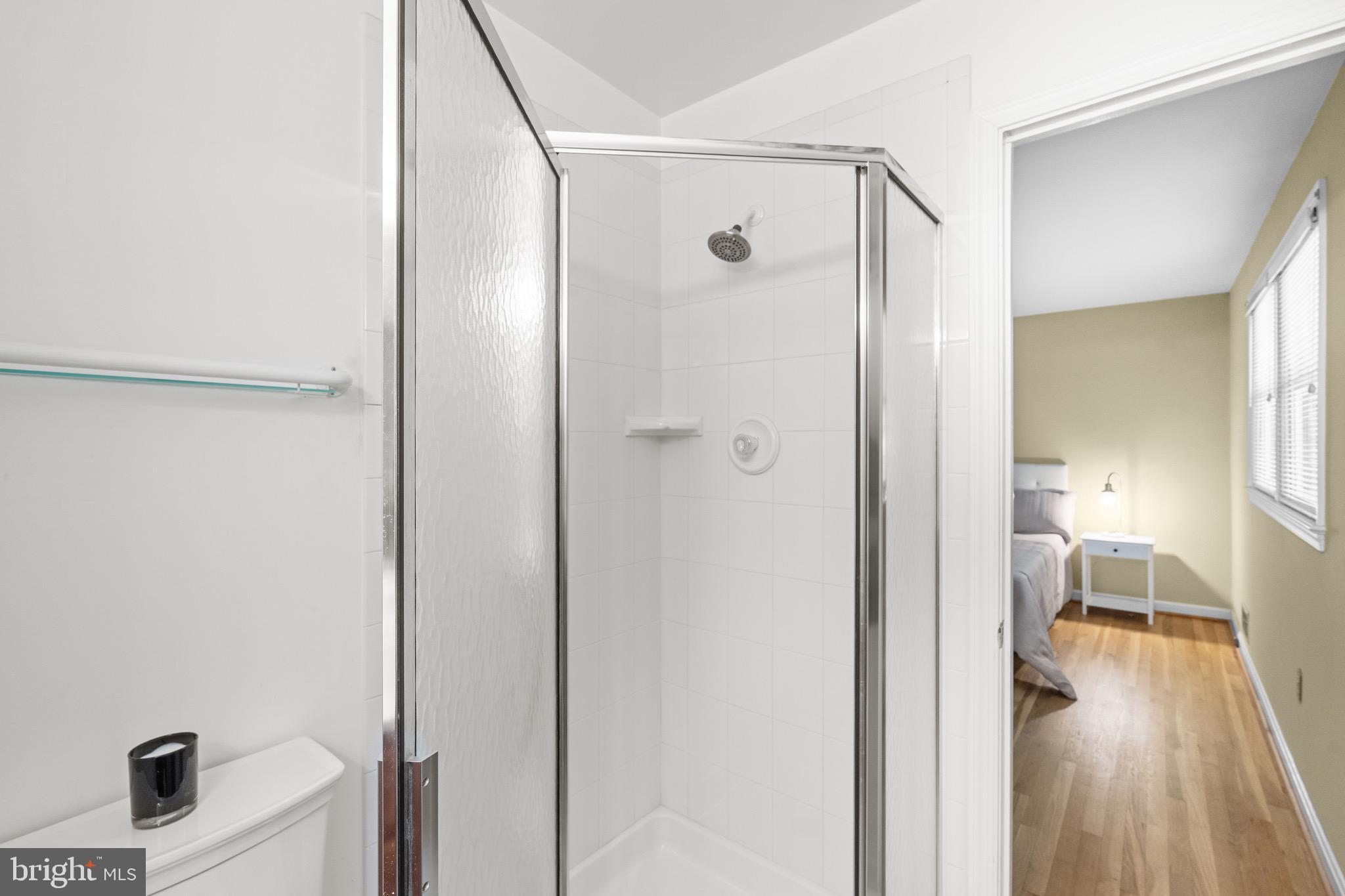 6604 Grey Fox Drive Springfield, VA 22152 - Photo 22 of 46 a bathroom with a shower and a sink