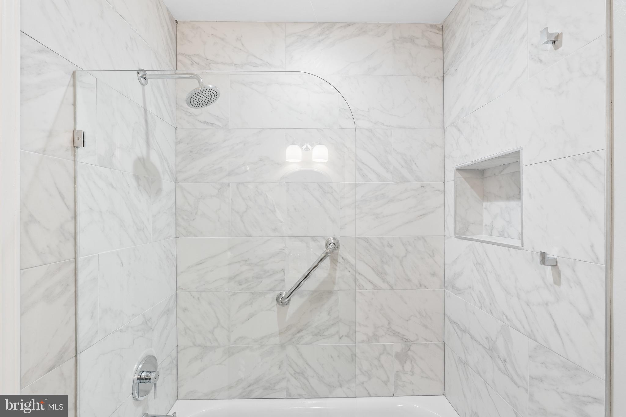 6604 Grey Fox Drive Springfield, VA 22152 - Photo 28 of 46 a bathroom with a shower