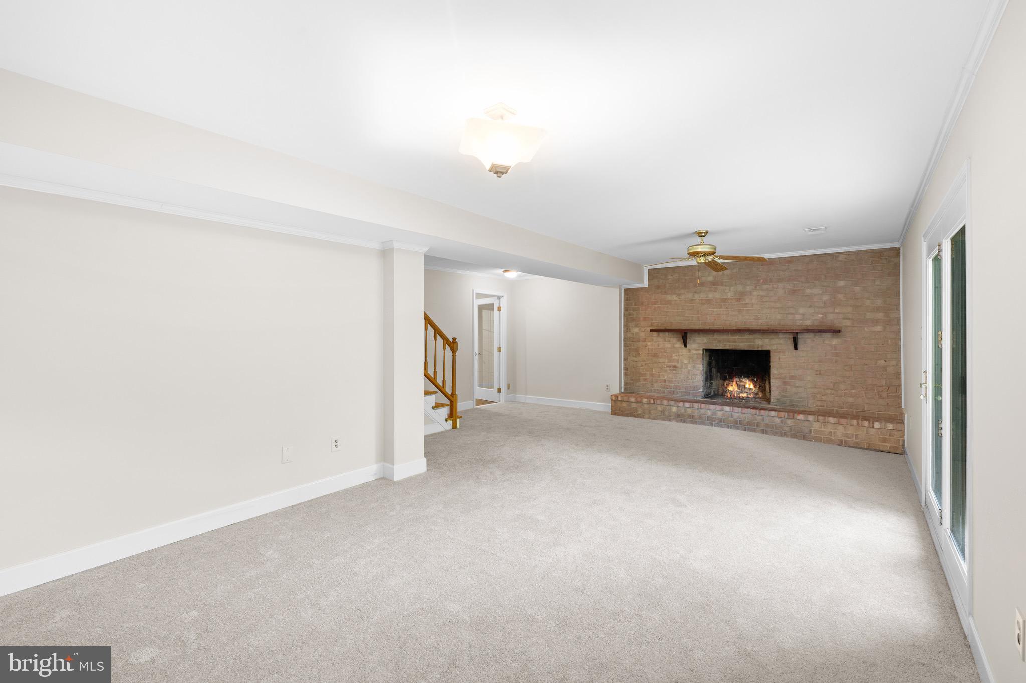 6604 Grey Fox Drive Springfield, VA 22152 - Photo 32 of 46 a view of empty room with a fireplace