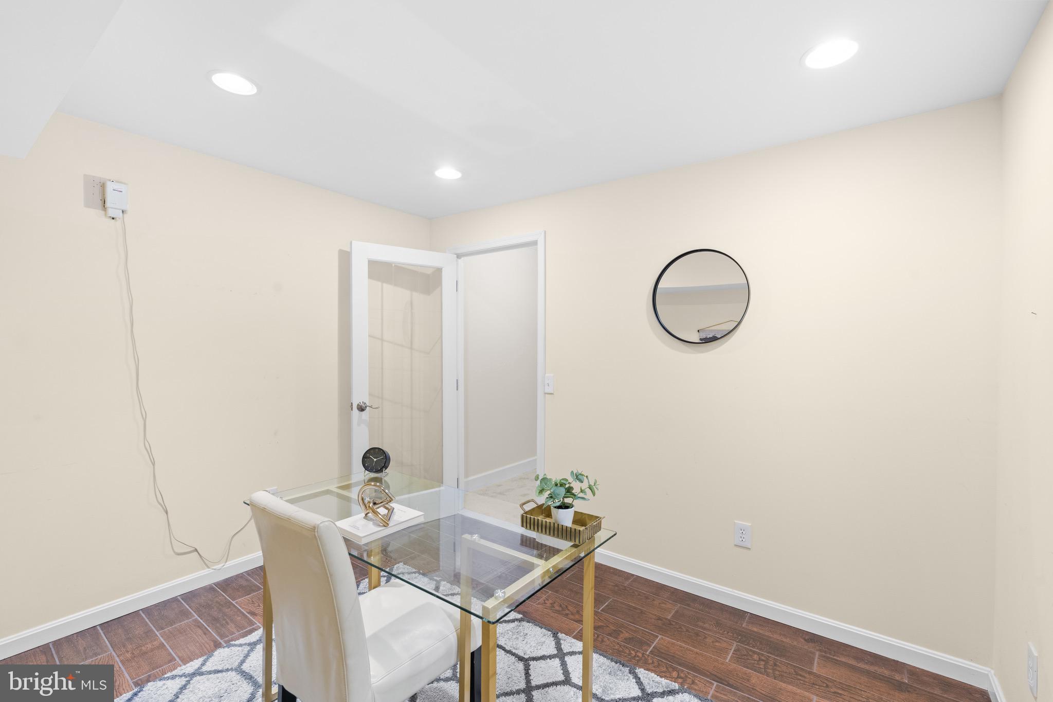 6604 Grey Fox Drive Springfield, VA 22152 - Photo 33 of 46 a view of a room with table and chairs