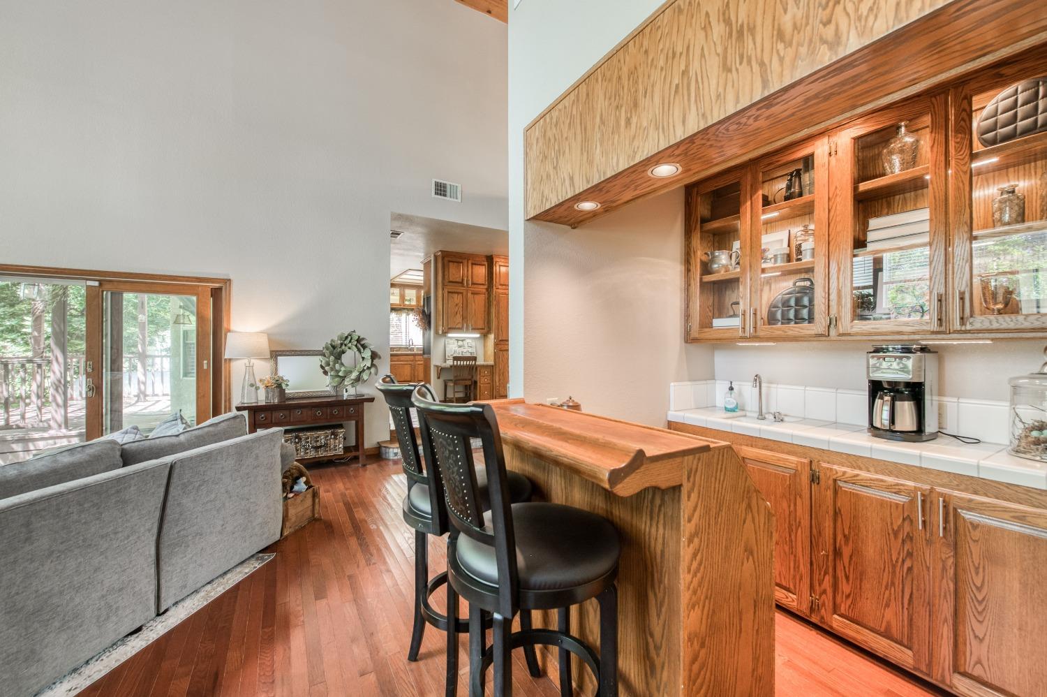 19408 Farallon Road Madera, CA 93638 - Photo 17 of 62 a kitchen with stainless steel appliances granite countertop a stove a sink and a refrigerator