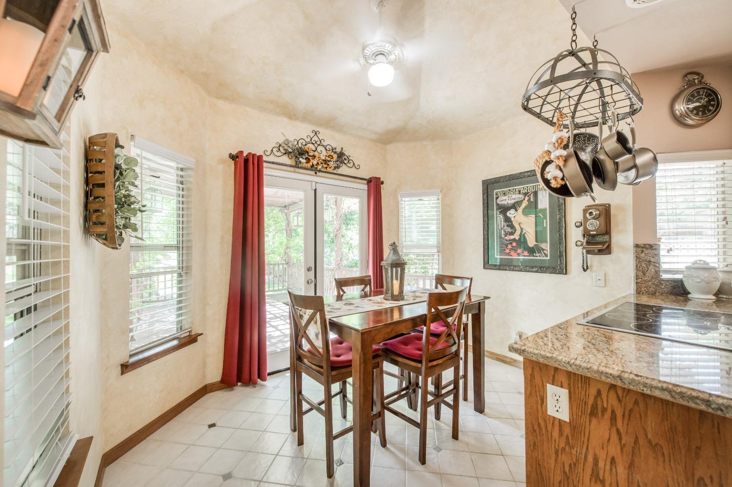 19408 Farallon Road Madera, CA 93638 - Photo 20 of 62 a view of a dining room with furniture window and outside view
