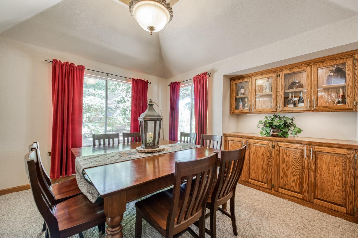 19408 Farallon Road Madera, CA 93638 - Photo 26 of 62 a dining room with furniture a chandelier and window