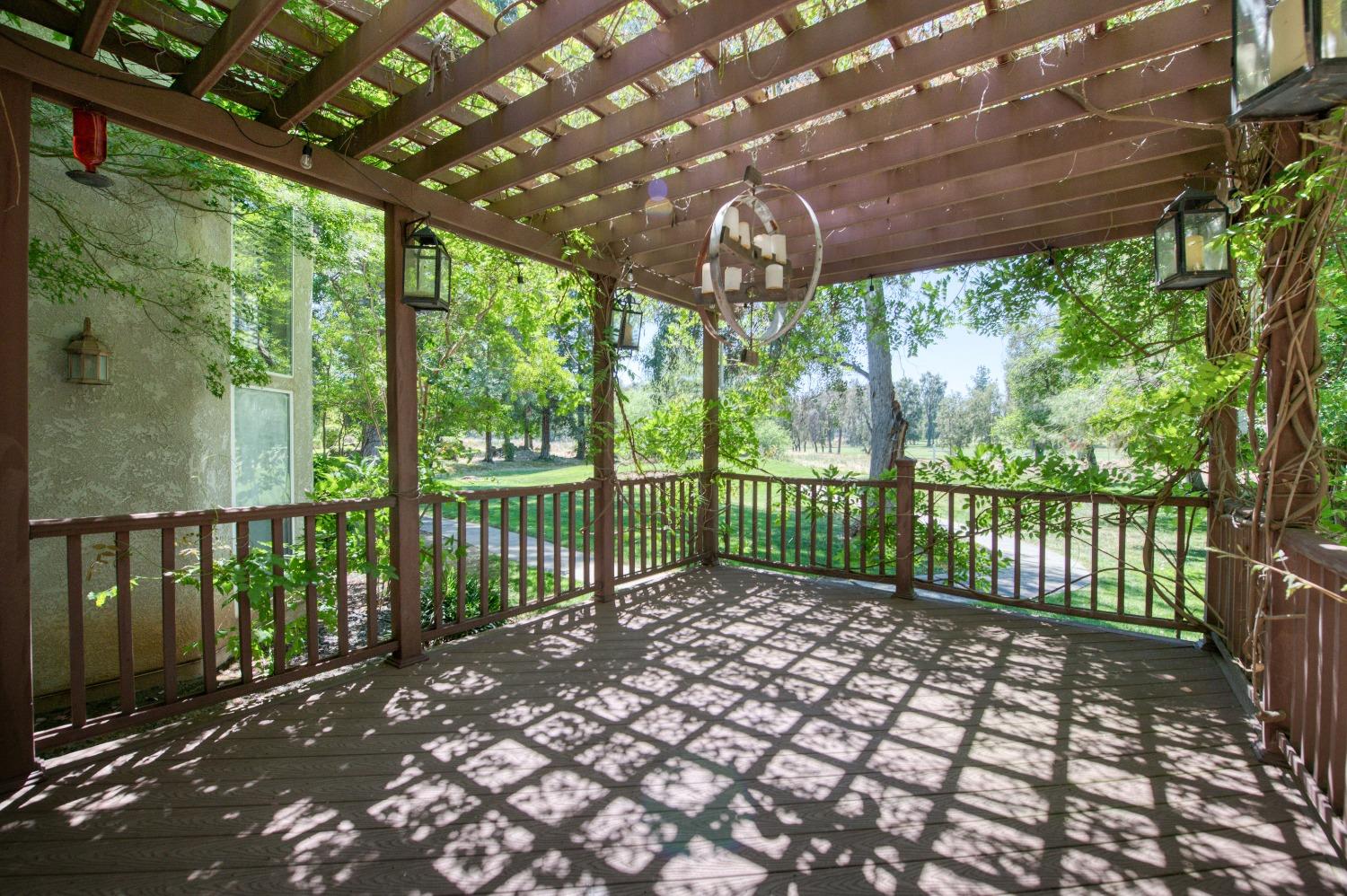19408 Farallon Road Madera, CA 93638 - Photo 44 of 62 a view of a porch with a swing