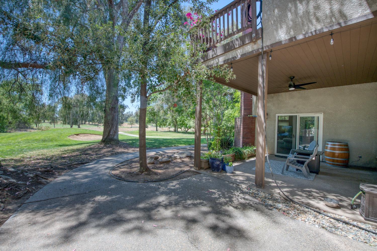 19408 Farallon Road Madera, CA 93638 - Photo 54 of 62 a view of a house with backyard and sitting area
