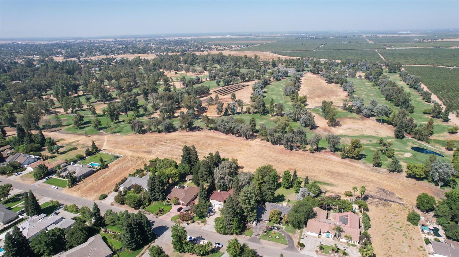 19408 Farallon Road Madera, CA 93638 - Photo 58 of 62 an aerial view of ocean and residential houses with outdoor space