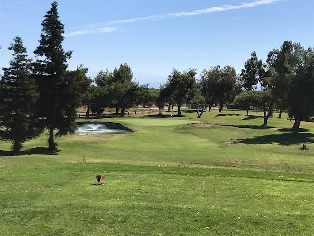 19408 Farallon Road Madera, CA 93638 - Photo 62 of 62 a view of a golf course with a park