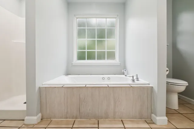 a bathroom with a sink a vanity and a mirror