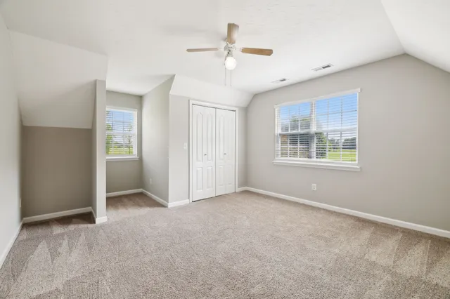 a utility room with sink dryer and washer