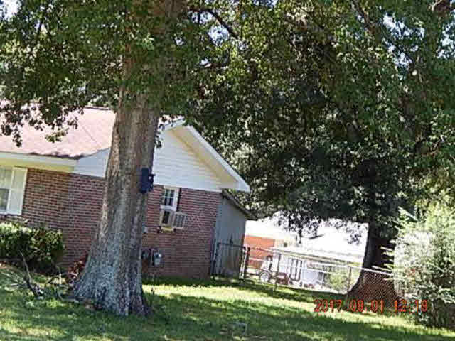 204 Greer Avenue Atmore, AL 36502 - Photo 2 of 16 Left Side