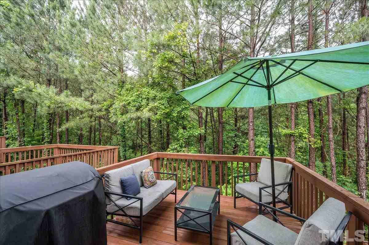 5414 Echo Ridge Road Raleigh, NC 27612 - Photo 19 of 22 a view of a two chairs in the deck