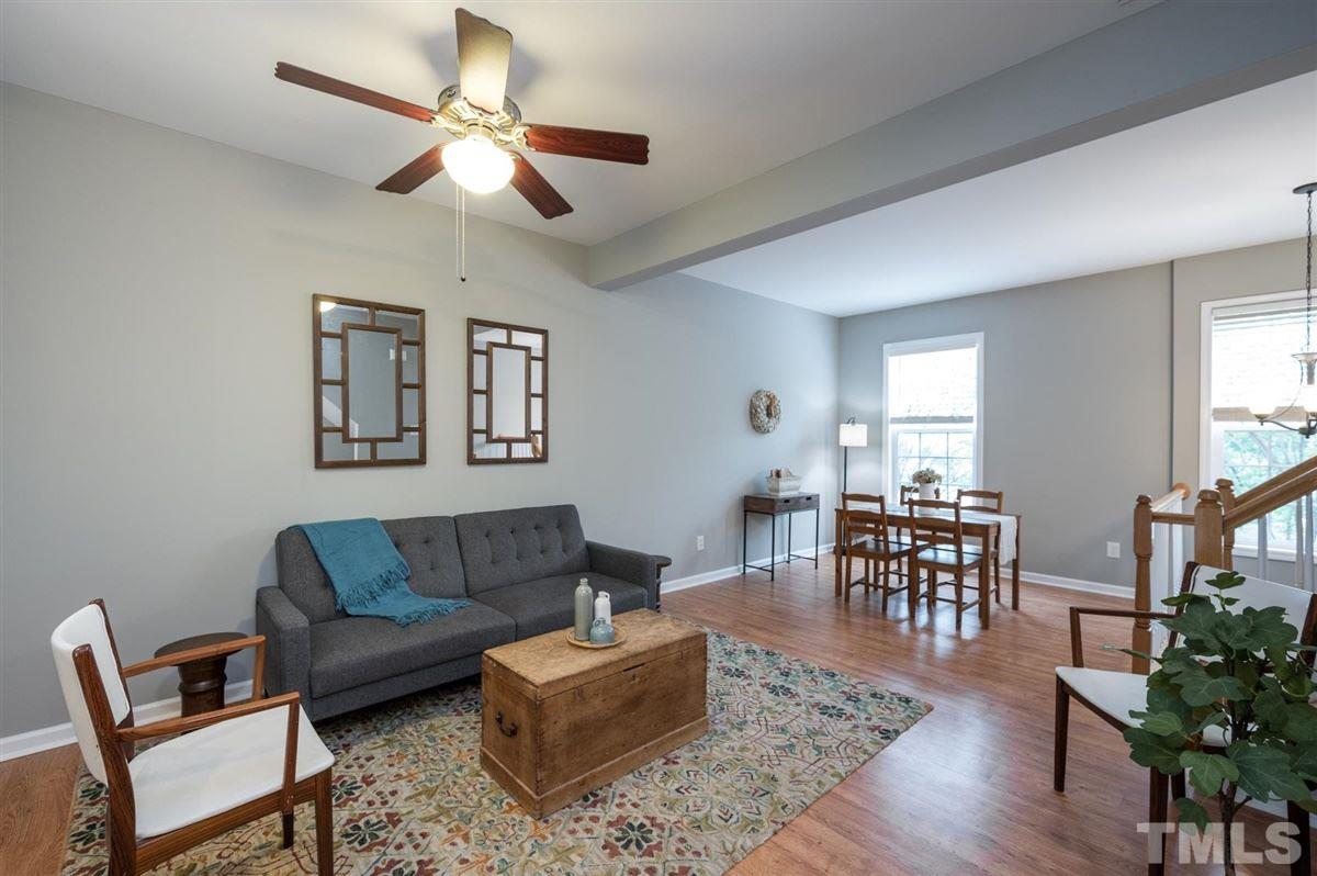 5414 Echo Ridge Road Raleigh, NC 27612 - Photo 3 of 22 a living room with furniture dining area and a window