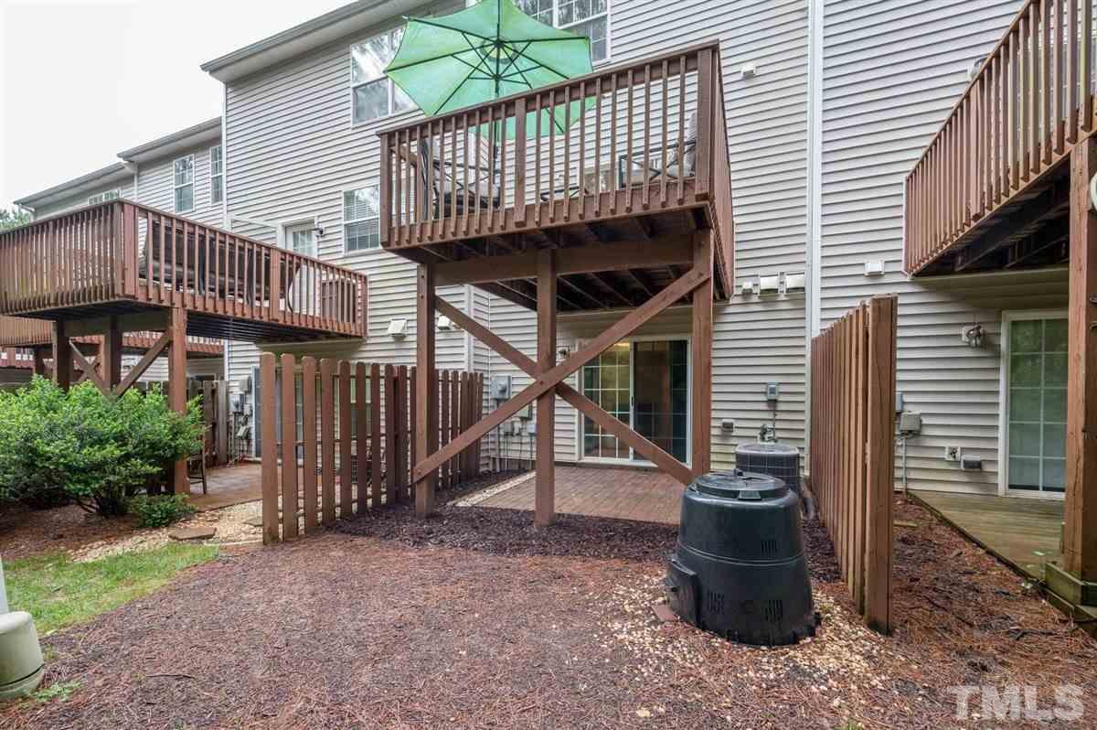 5414 Echo Ridge Road Raleigh, NC 27612 - Photo 21 of 22 a view of a house with a deck