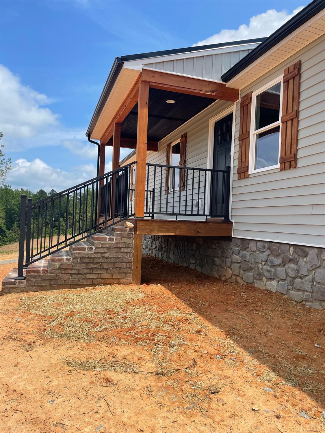819 Winfall Road Rustburg, VA 24554 - Photo 4 of 15 a view of house with a yard