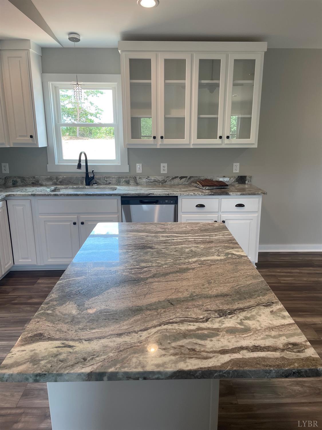 819 Winfall Road Rustburg, VA 24554 - Photo 10 of 15 a view of granite countertop cabinets and window