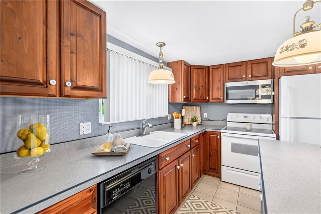 312 Gringo Independence Road, Unit R Aliquippa, PA 15001 - Photo 5 of 49 Beautiful wooden cabinetry offers plenty of storage.