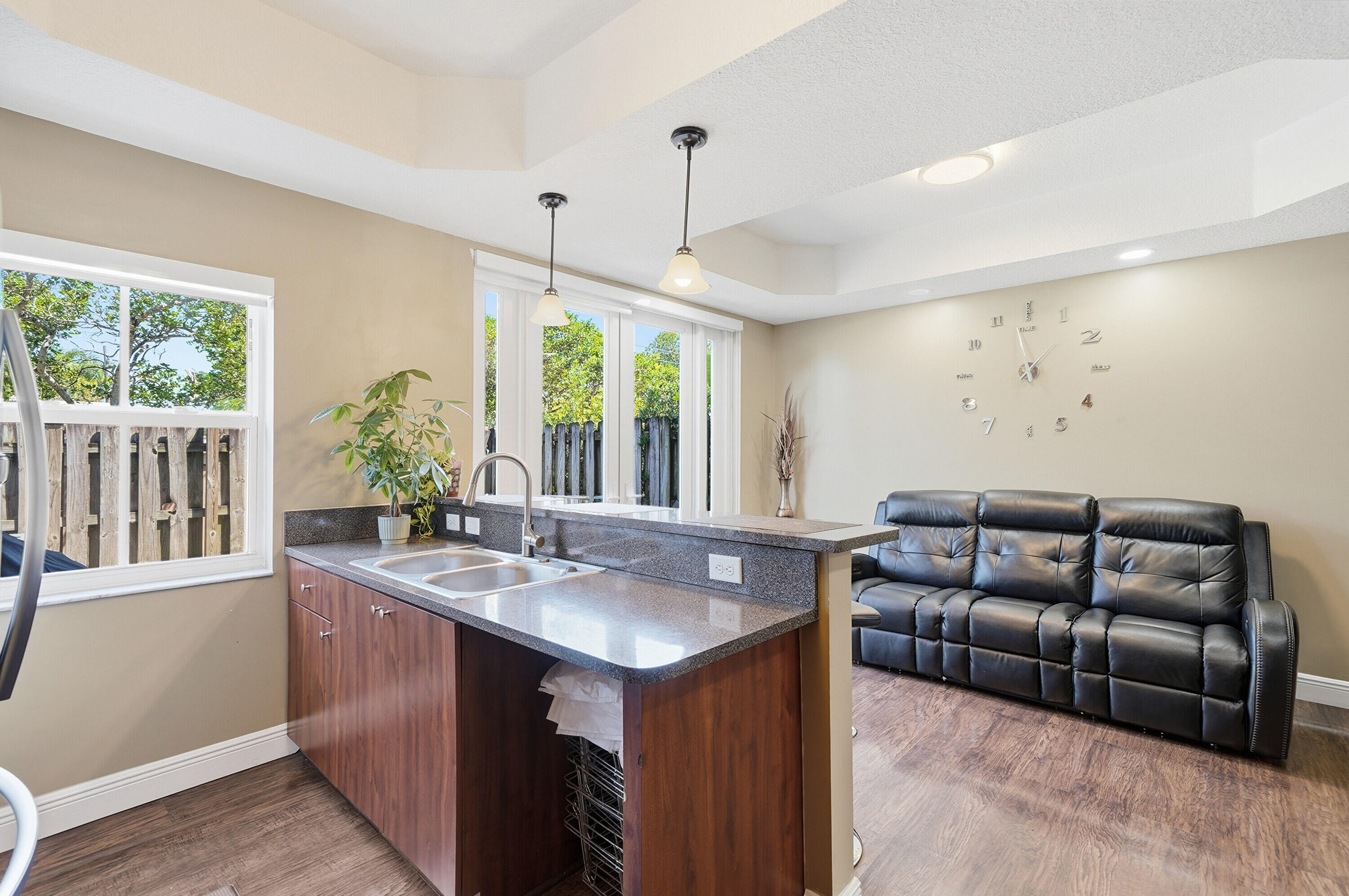 5825 Siena Lane Hollywood, FL 33021 - Photo 12 of 26 a living room with furniture and a flat screen tv